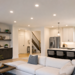 Modern living room with modern LED recessed lighting installation on ceiling